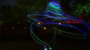 Super Flow Flyer is a performance kite you can fly anywhere, without any wind, with LED lights for a groovy light show at night!