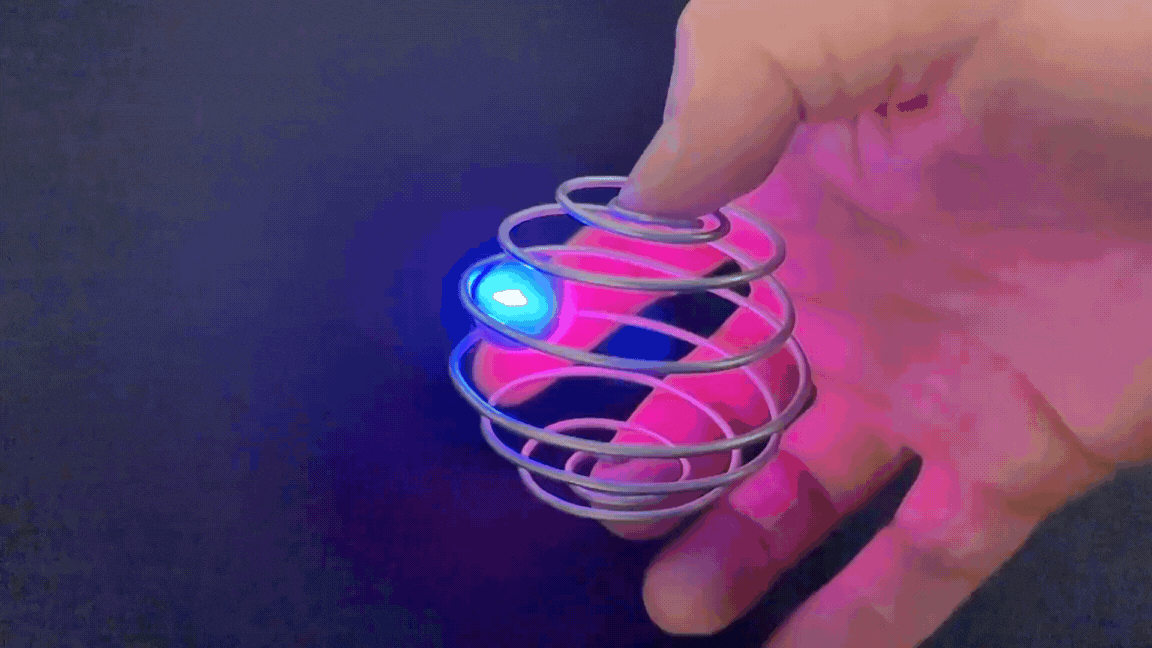 Zorbit Sphere by Super Flow Yo is a hand-held spiral cage for spinning bright LED marbles for a groovy lightshow in your hand.