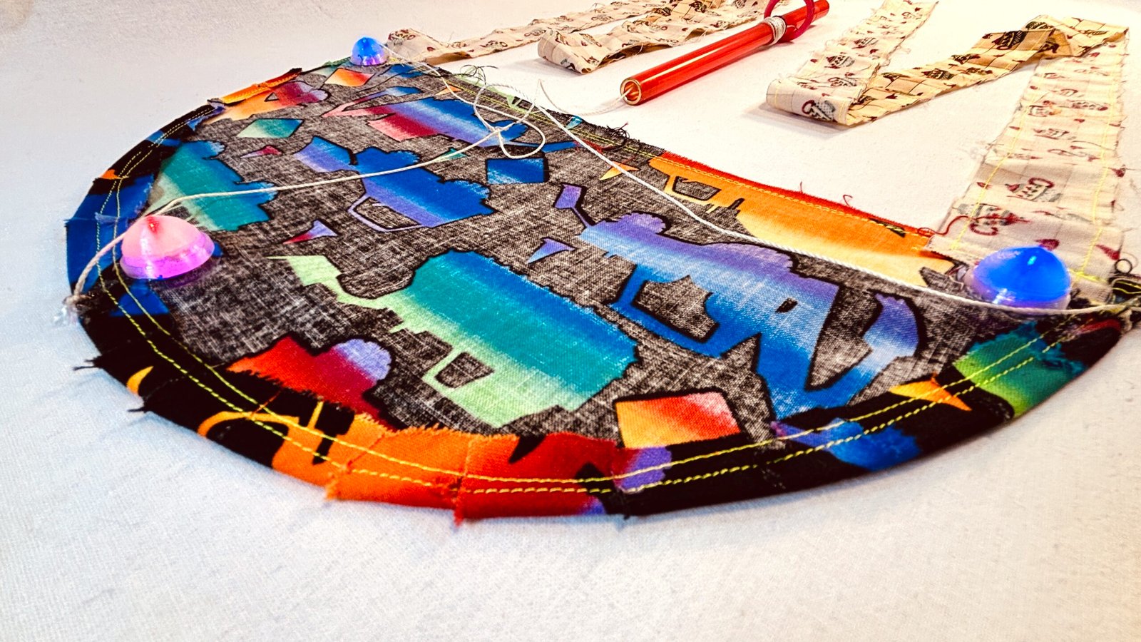 Super Flow Flyer is a performance kite you can fly anywhere, without any wind, with LED lights for a groovy light show at night!