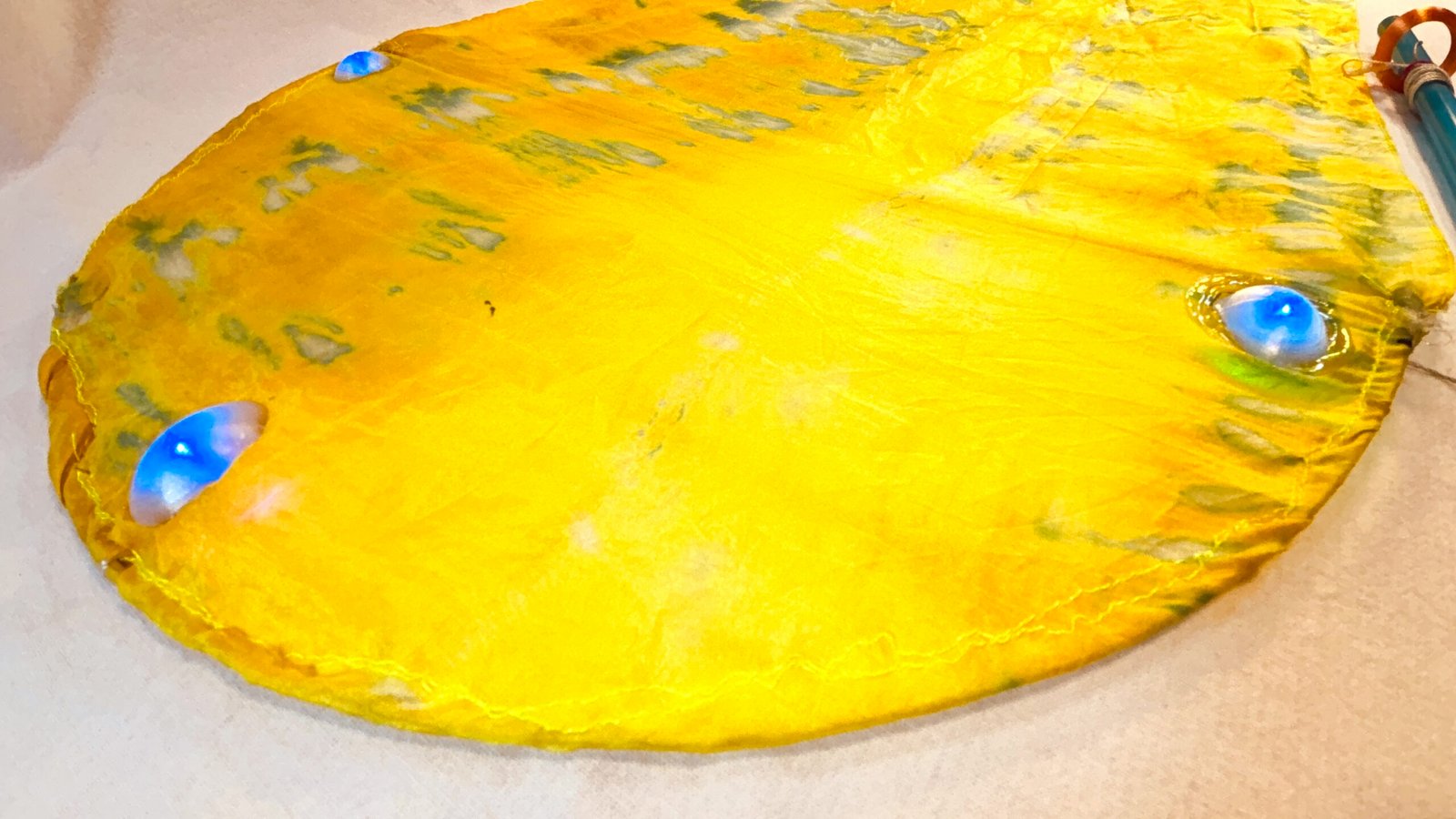 Sail detail-Super Flow Flyer is a performance kite you can fly anywhere, without any wind, with LED lights for a groovy light show at night!