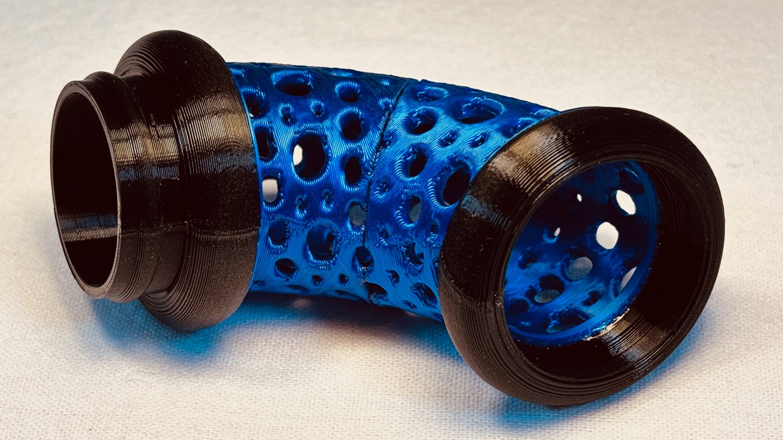 Build Super Flow Tubes into a groovy LED marble run sculpture you can display, play and dance with! Blue curve Tube detail. Patent Pending # 19/203,500.