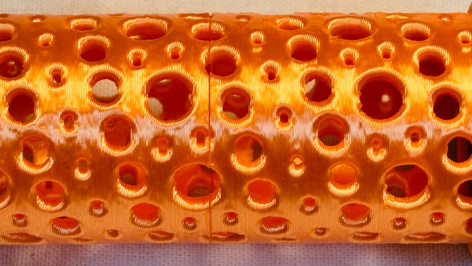 Super Flow Tubes! Straight orange Tube detail, a groovy marble run sculpture you can display, play and dance with! Patent Pending # 19/203,500.