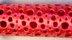 Super Flow Tubes! Straight pink Tube detail, a groovy marble run sculpture you can display, play and dance with! Patent Pending # 19/203,500.