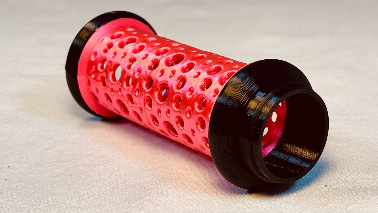 Build Super Flow Tubes into a groovy LED marble run sculpture you can display, play and dance with! Red Tube detail. Patent Pending # 19/203,500.
